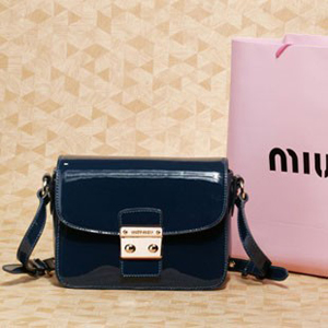 ミュウミュウスーパーコピー MIUMIU サイドリボン 2WAYバッグ ダークブラウン リボン付き シャイ二ーカーフ VITELLO LUX RN0365 X73 F0038